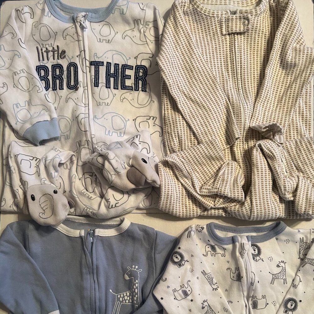 4 Like new baby sleepers size 6-9 mos. Carters, Koalababy & 2 Tales & Stores
